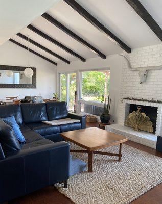 Wood beams went from white to dark brown stain.