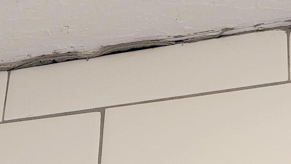 Grout over blue painters tape