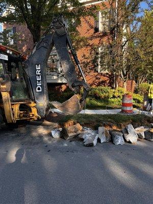 The machinery used to tear up sidewalks at 6:45 am