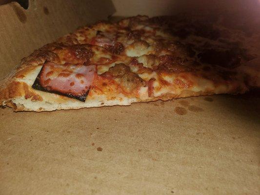 Paid 3 dollars more think crust. Looks pretty thin to me.