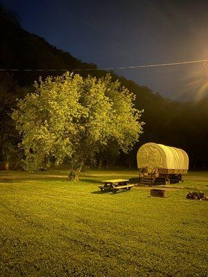 Conestoga Wagon with fire ring and picnic table