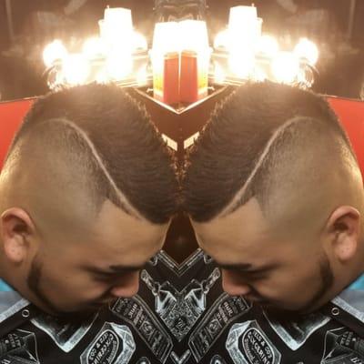 High blend mohawk with a part