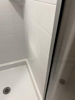 Shower wall bulging away from actual wall