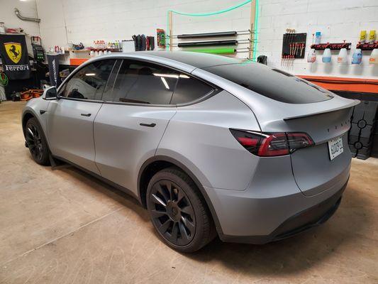 Tesla model Y gets wrapped in Nardo Satin Grey