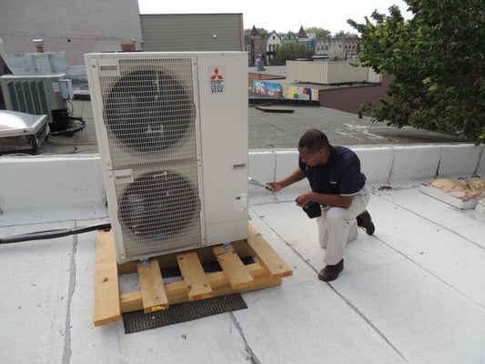 inspecting roof-top compressor unit