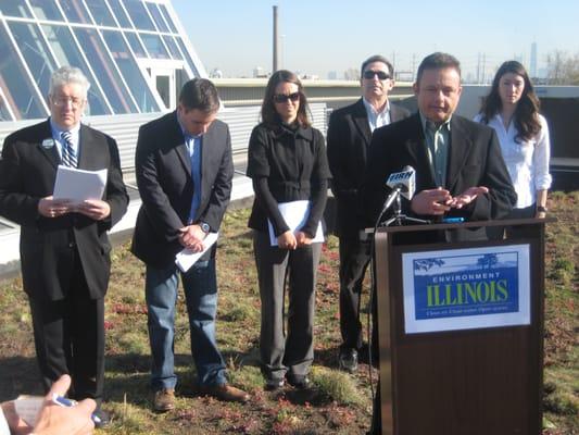 Greg at Solar press conference.  Greg was informing the public that you must reduce energy consumption before producing your own