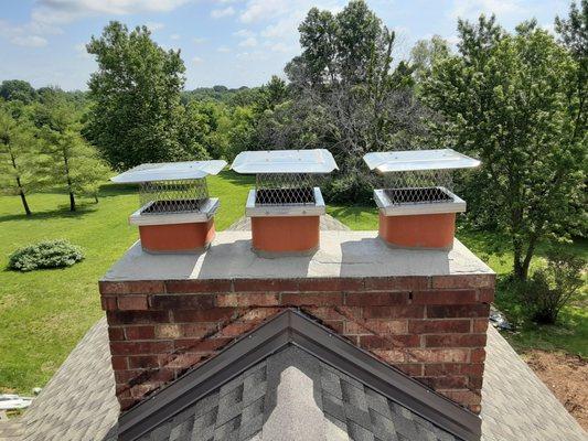 New caps and fresh Crown Coat sealant for three flues