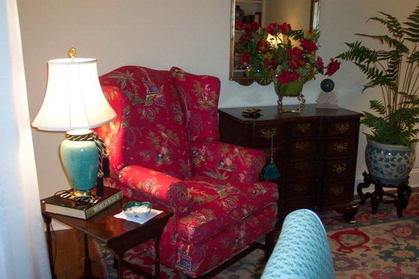 Wing chair with large print.