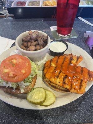 Buffalo chicken sandwich and sautéed mushrooms