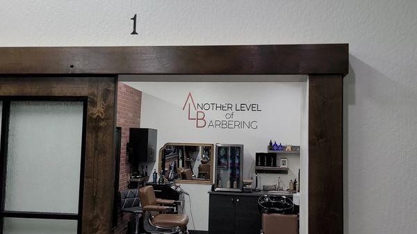 When you slide the barn door open, you'll see our business name on the wall.