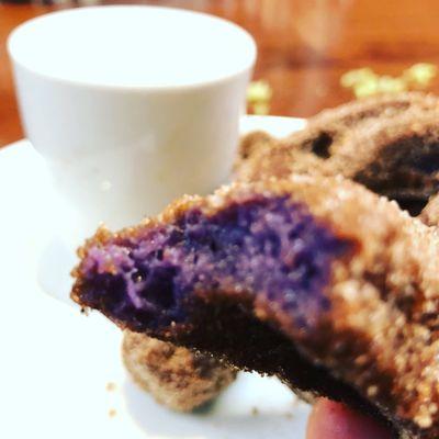 Fried cauliflower, longanisa with leeks cooked rice, adobo fried chicken & buko pansan waffles, and ube churros and dip.