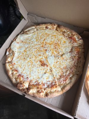 Cheese Pizza that has been cut horribly. I don't even know how this is possible.