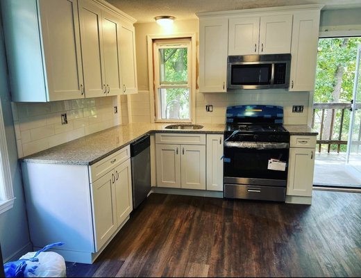 After Kitchen Reno - 

Countertop installation 
Tile backsplash