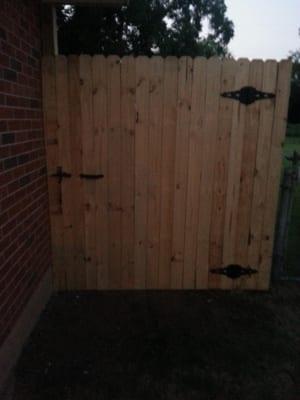 Tore old fence out and built a new privacy fence around the entire back yard, including this new gate.