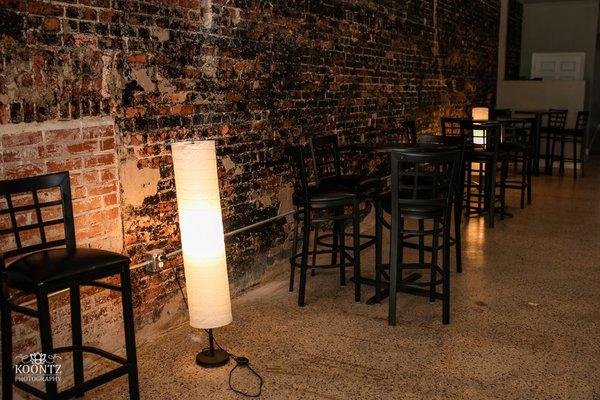 The venue highlights the original brick wall, theater crown molding and terrazzo floors in the 3800 square foot space.