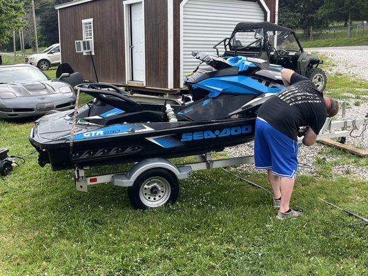 Detailing a customer's jet ski