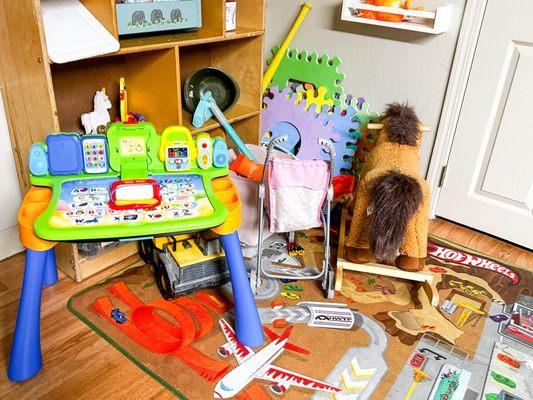 Shelter common area: We have a children's play room full of toys, space, and activities to be kids.