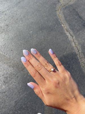 Lovely lavender acrylics with a sparkly gel over two nails