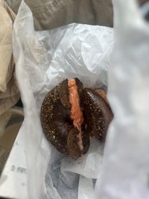 Toasted pumpernickel bagel with lox