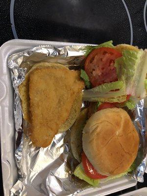 A look inside one sandwich. Two good tomato slices and romaine lettuce (not my wife's favorite lettuce unfortunately).