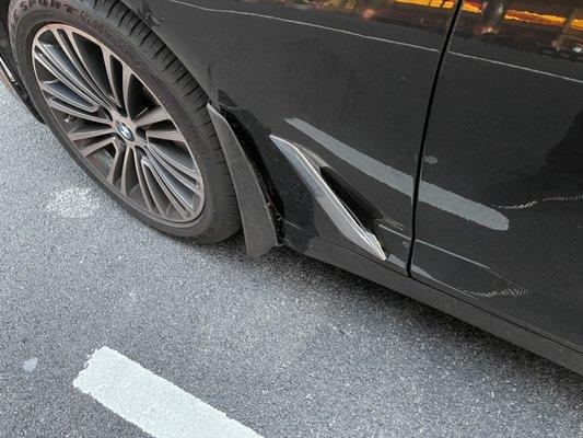 Driver side rocker panel and driver side fender pushed in, more damage hidden behind the fender as well.