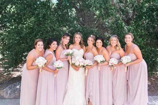 Pretty in Pink! Bridesmaid dresses from B2 by Jasmine Bridal in the color 'Misty Pink.'