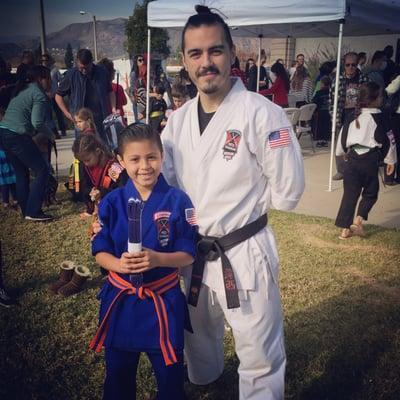 Andy promoting to Blue Belt! Thank You sensei David for all your Help and dedication towards our Little Dude!