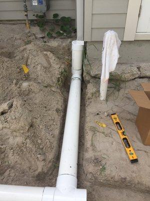 Drain piping installed to carry water away from the house.