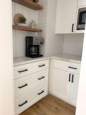 Coffee nook with white oak floating shelves