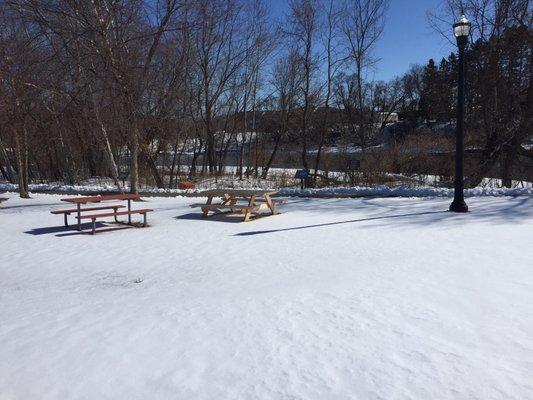 Along the river walk (next to Library)