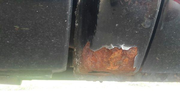 This shouldn't happen after 2 months of owning a vehicle when there is "zero" rust. It was painted over.