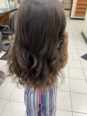 Hair cut with layers and lovely curls