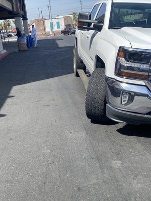 Tire turned and pointed away from oncoming vehicle. But it still hit another vehicle