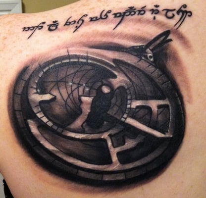 Astrolabe tattoo with Elvish script done by Mike.