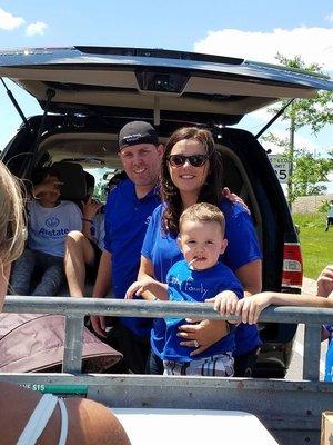 Brian and Amber Murphy with their youngest son at the Roselle Rose parade 2018