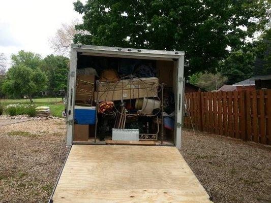 Fully loaded enclosed trailer.