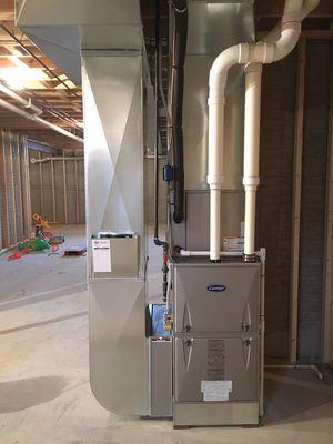 Carrier new house installation. JandJ Heating and Air Conditioning provides custom design built and installed hvac systems.