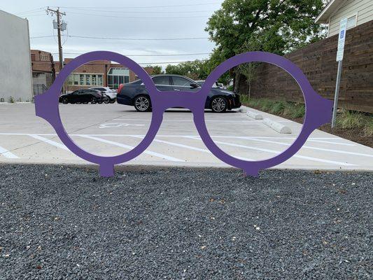 Bicycle Rack in the back with plenty of parking.