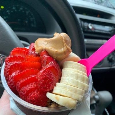 Acai base bowl with double strawberries peanut butter and banana