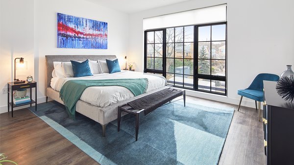 Bedroom with large windows