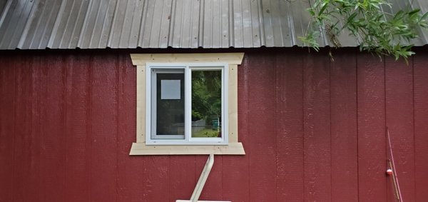 Storage barn converted to office space. Added window.