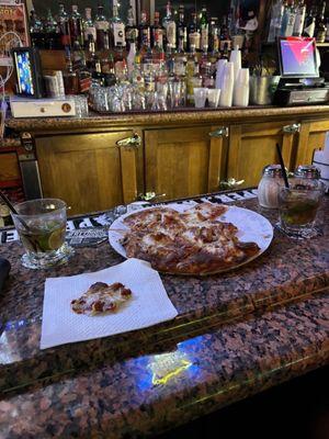 Jakeenos sausage and pepperoni pizza with a great rum and diet drink.