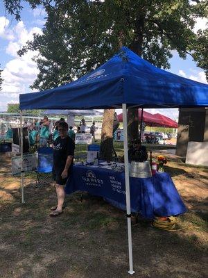 Our booth at the Paris Henry County Chamber of Commerce Water Fun Run