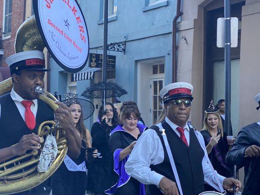 2nd Line fun and Halloween witches parading by Madame Aucoin Perfume shop.