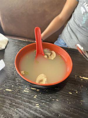 Very delicious Suimono Soup which is chicken broth mushrooms and chives.