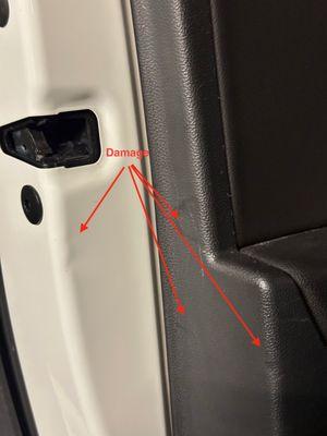 Dents in door, and damage marks on interior panel