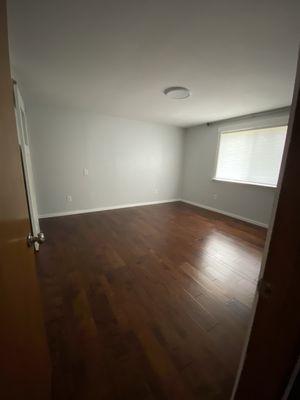 The master bedroom new flooring from Robinson Hardwood Flooring.