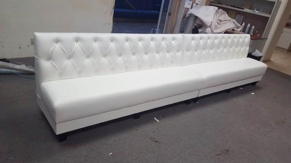 Diamond tufted with marine vinyl for outdoor seating.