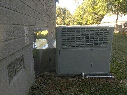 External filter door with hinge and hasp for easy filter replacement.