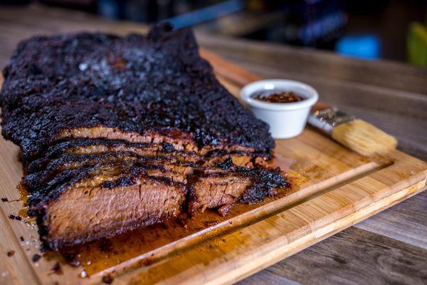 We don't play when it comes to our BBQ.  We smoke our meats 6-12 hours over hickory wood. Try our deliciously slow-smoked brisket today.